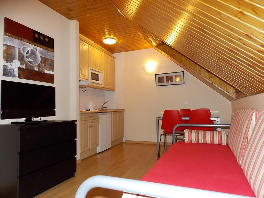 Apartamentos Fidalgo Sandiniés Værelse billede